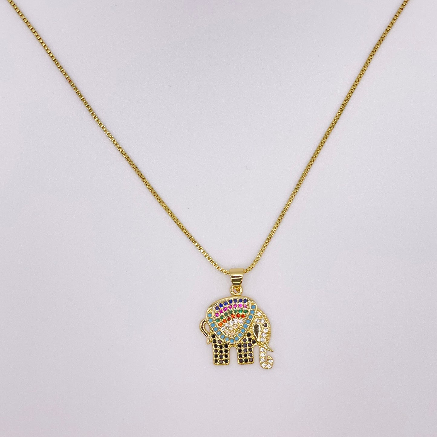 Golden elephant necklace front view