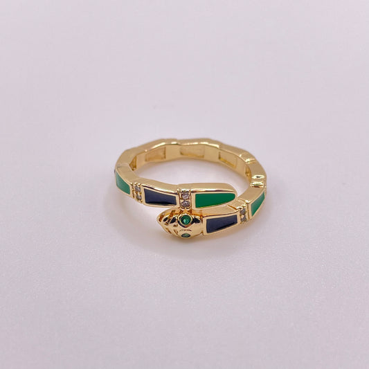 Gold snake ring - Black & Emerald laying flat