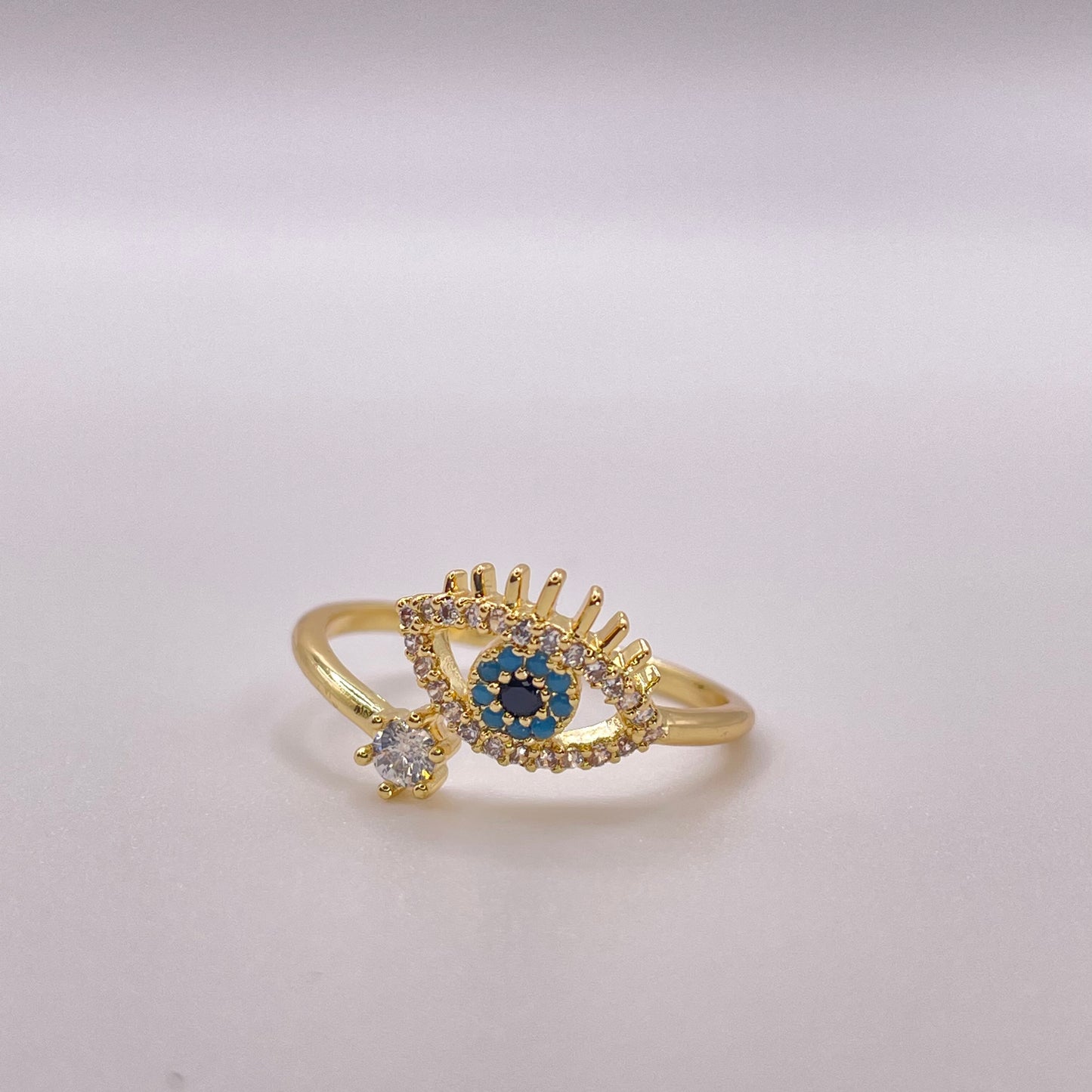 CZ tear evil eye ring - Gold laying down