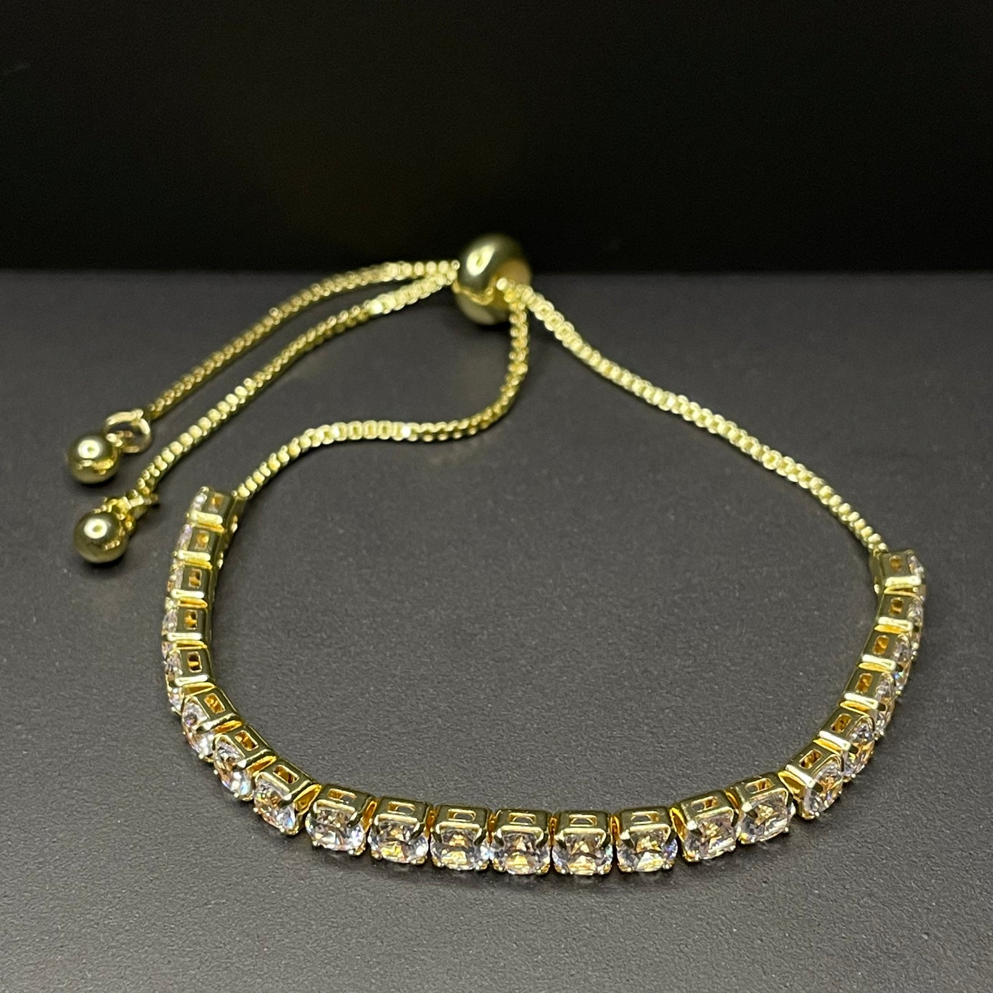 Glam gold bracelet above view