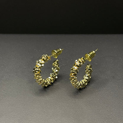 Ariella gold earrings standing