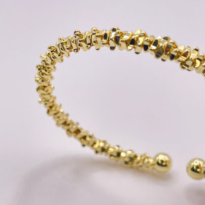 Ariella gold bracelet side view