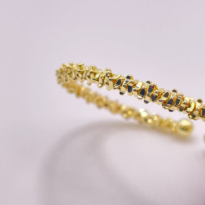 Ariella gold bracelet standing view