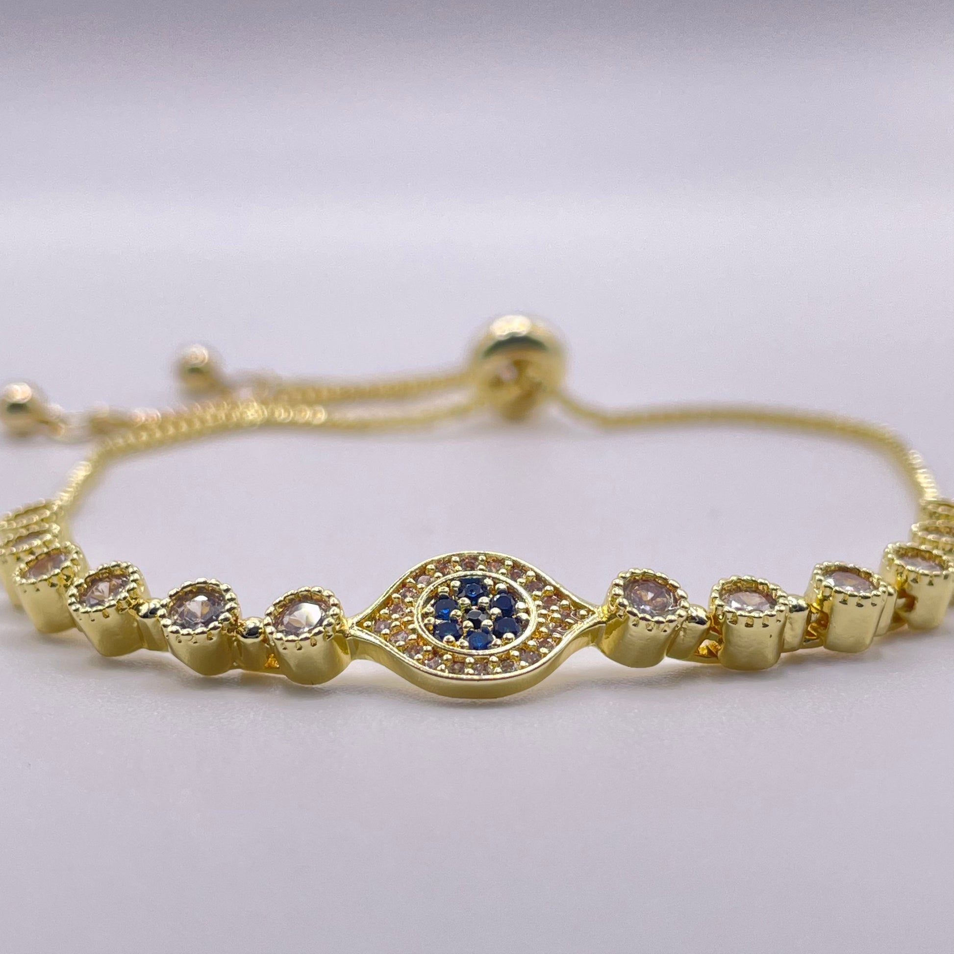 Cubic zirconia eye charm bracelet - Gold front view