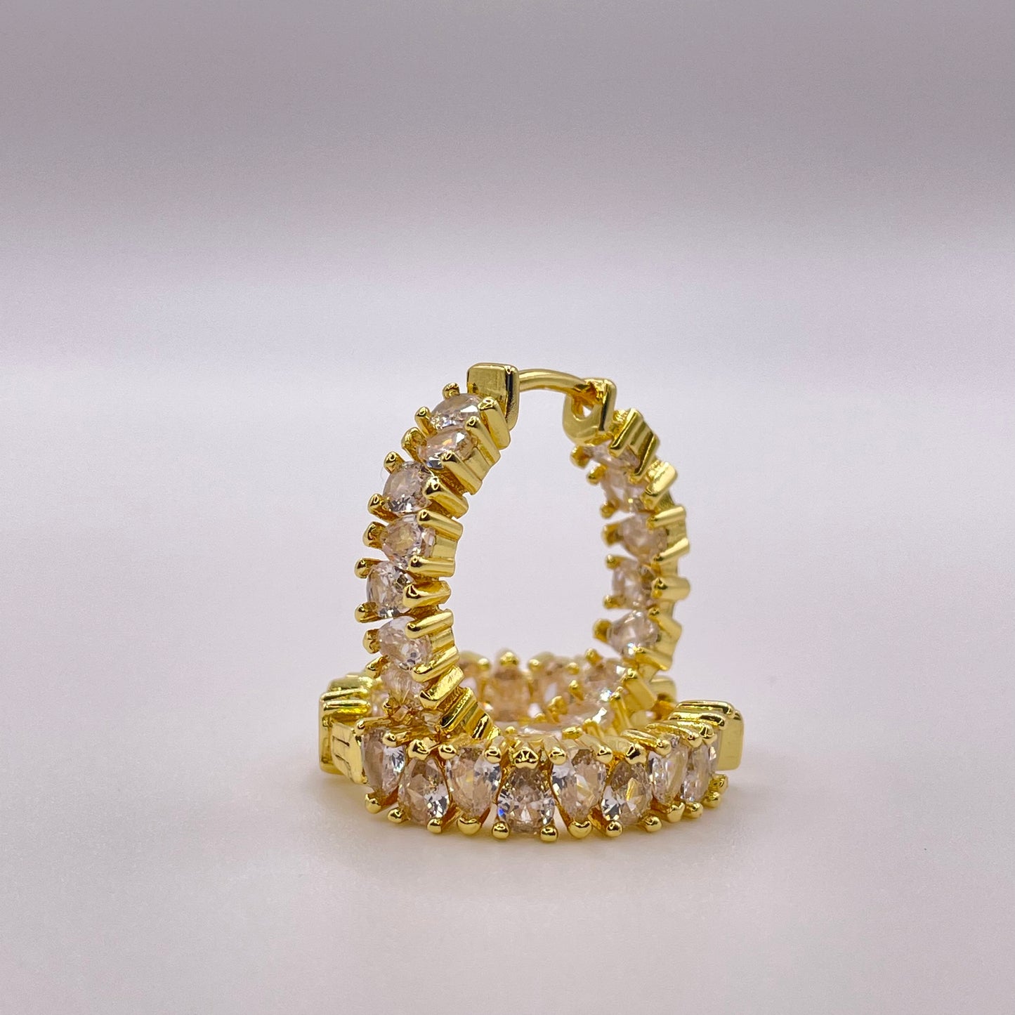 Baguette cut CZ collection - Gold earrings close up