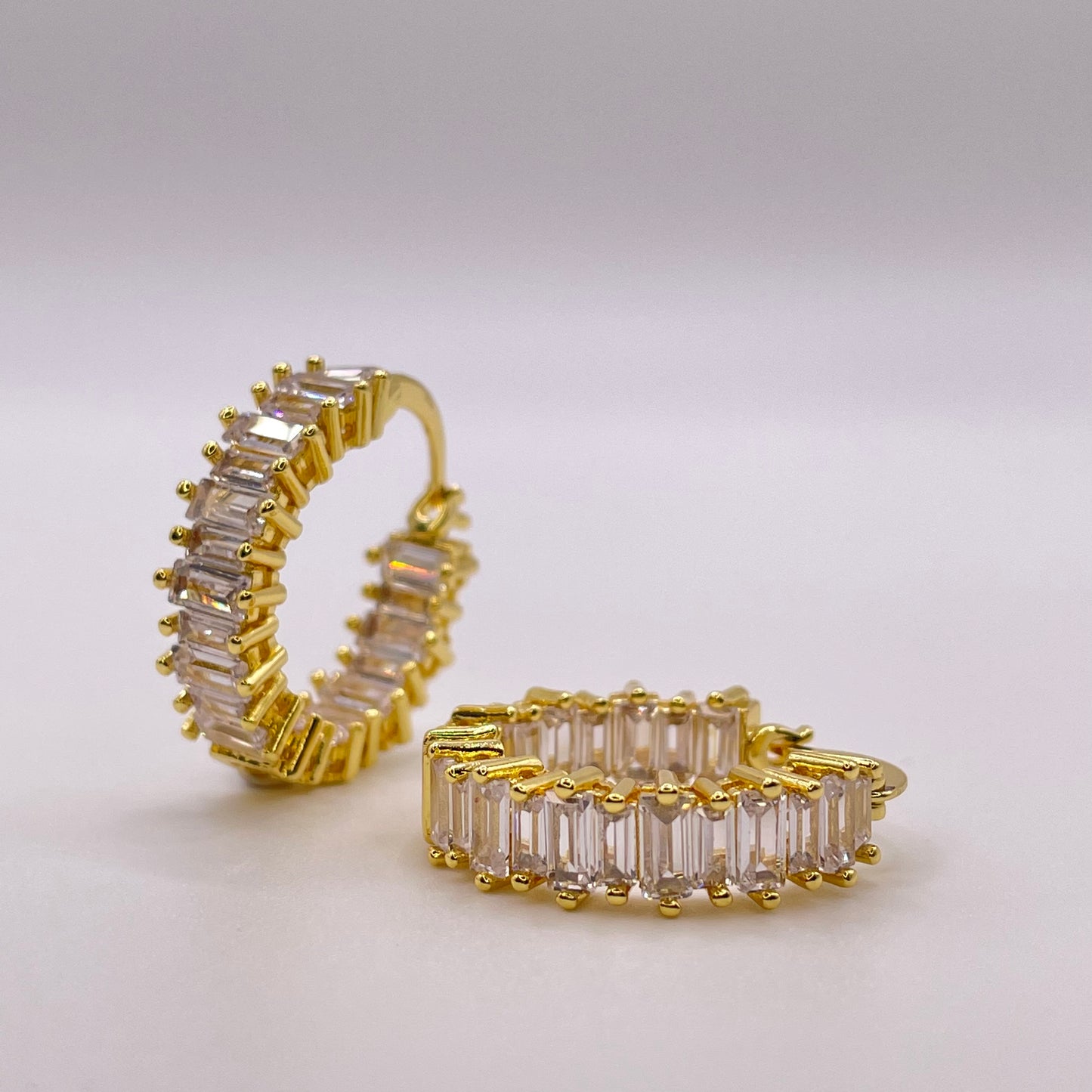 Baguette cut CZ earrings - gold one flat